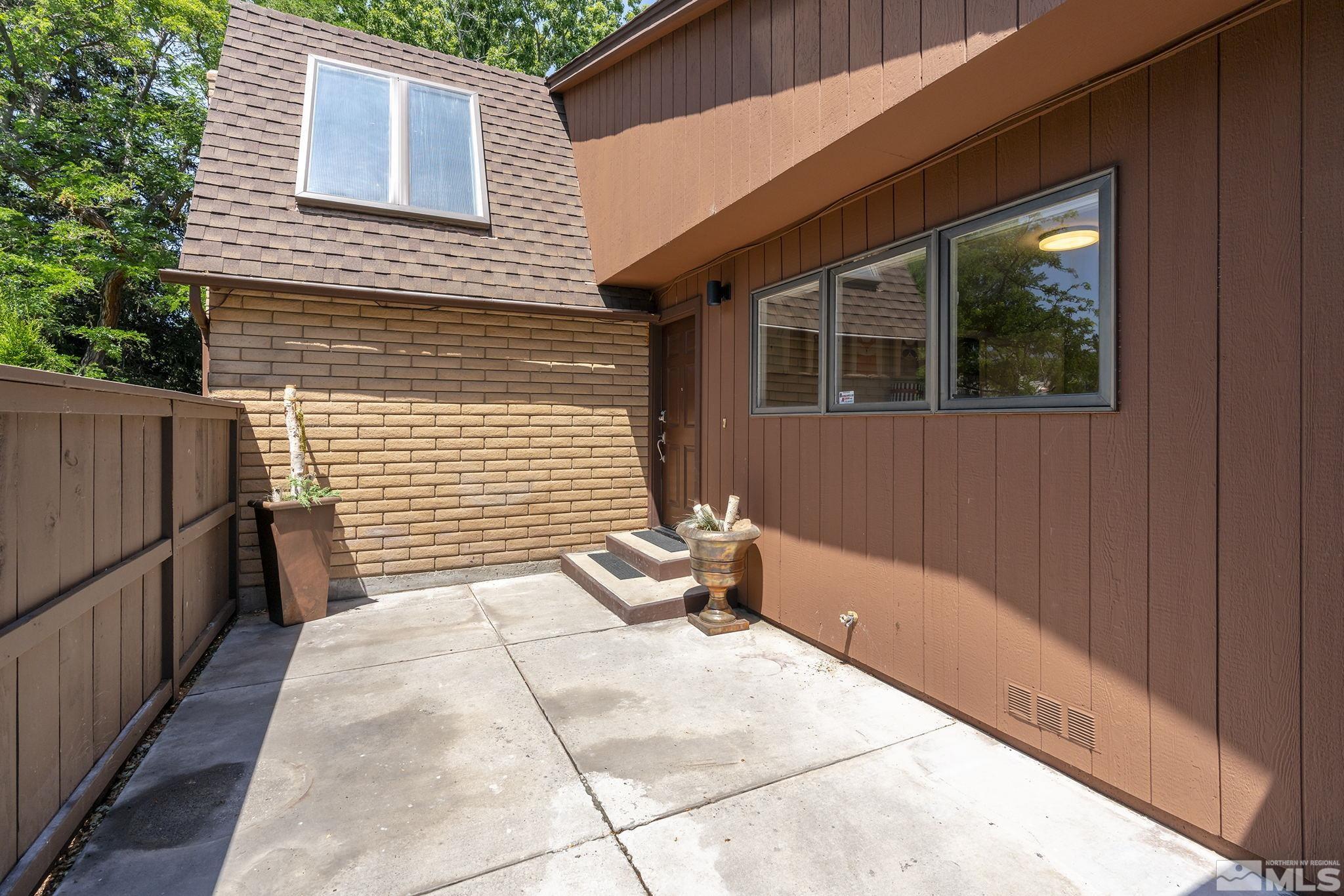 1953 South Villa Way Reno, NV 89509 - Photo 30 of 31 a backyard of a house with outdoor seating