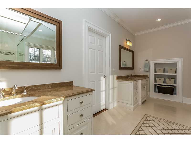 101 Raymond Street Darien, CT 06820 - Photo 15 of 25 a kitchen with a refrigerator and cabinets