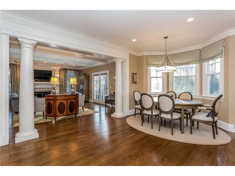 101 Raymond Street Darien, CT 06820 - Photo 7 of 25 a view of a dining room with furniture and wooden floor