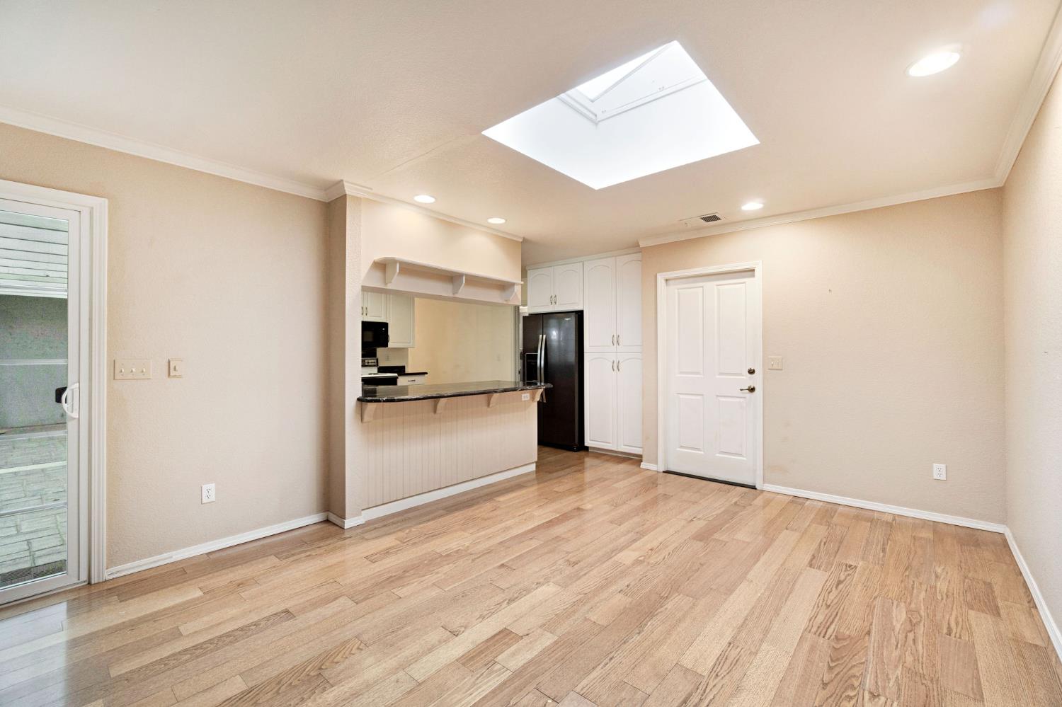 2020 Short Drive Hanford, CA 93230 - Photo 13 of 38 a view of a kitchen with a sink and a refrigerator