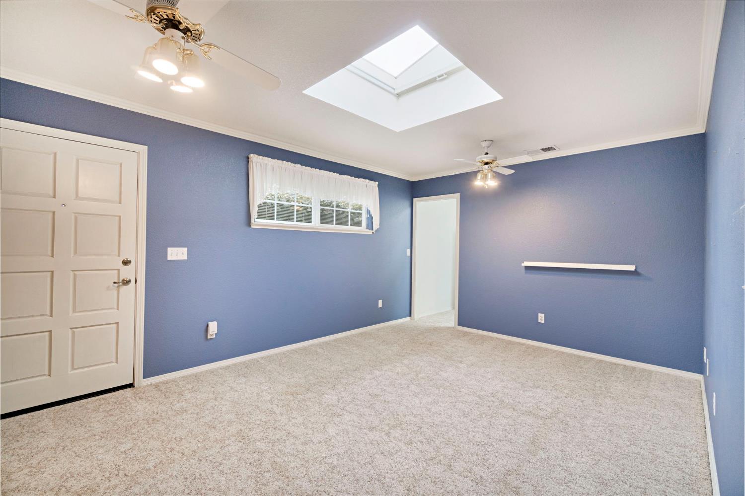 2020 Short Drive Hanford, CA 93230 - Photo 16 of 38 a view of an empty room with a window