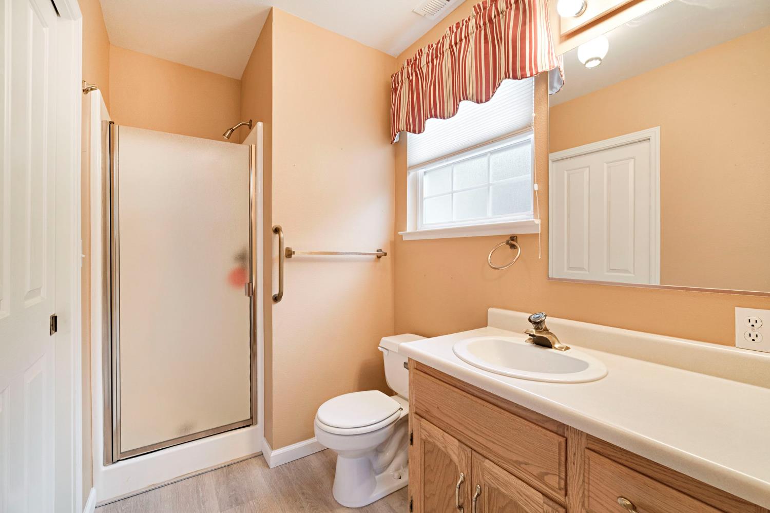 2020 Short Drive Hanford, CA 93230 - Photo 18 of 38 a bathroom with a sink toilet and shower