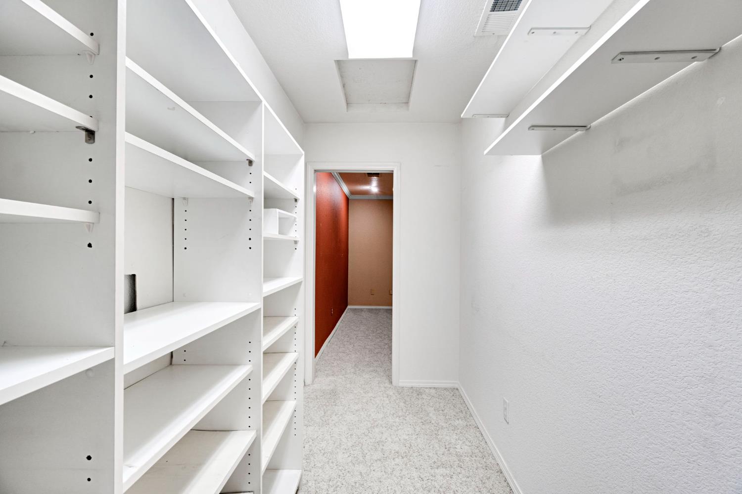 2020 Short Drive Hanford, CA 93230 - Photo 19 of 38 a view of hallway with stairs and wooden floor