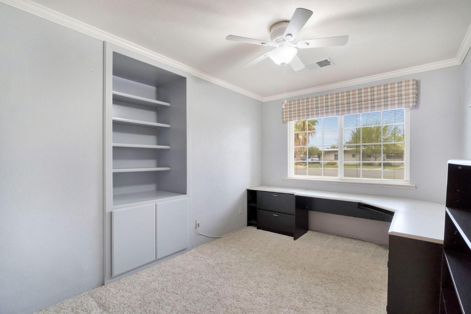 2020 Short Drive Hanford, CA 93230 - Photo 20 of 38 a living room with furniture and window