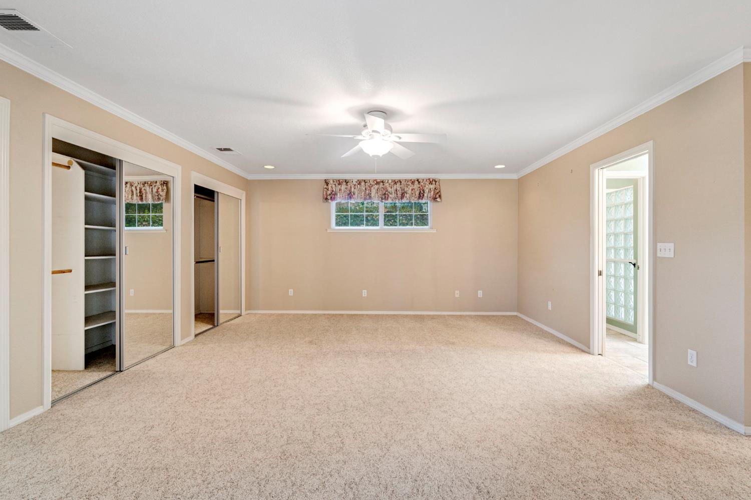 2020 Short Drive Hanford, CA 93230 - Photo 26 of 38 en empty room with windows and cabinet