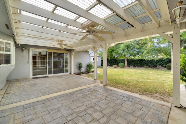 a view of livingroom with furniture and garden