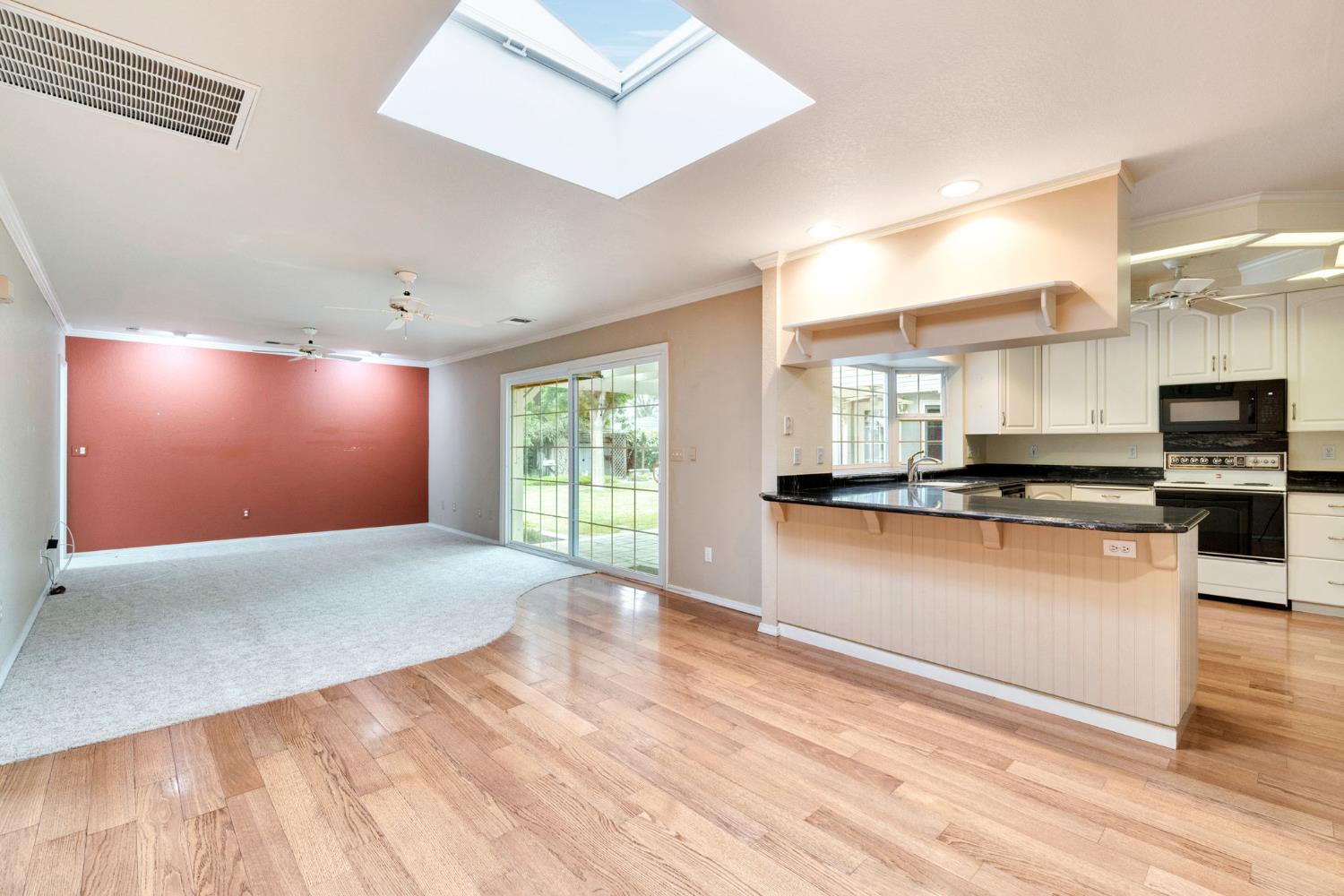 2020 Short Drive Hanford, CA 93230 - Photo 6 of 38 a kitchen with stainless steel appliances granite countertop a stove a sink and a refrigerator