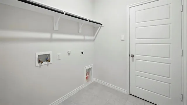 a kitchen with granite countertop cabinets stainless steel appliances and wooden floor