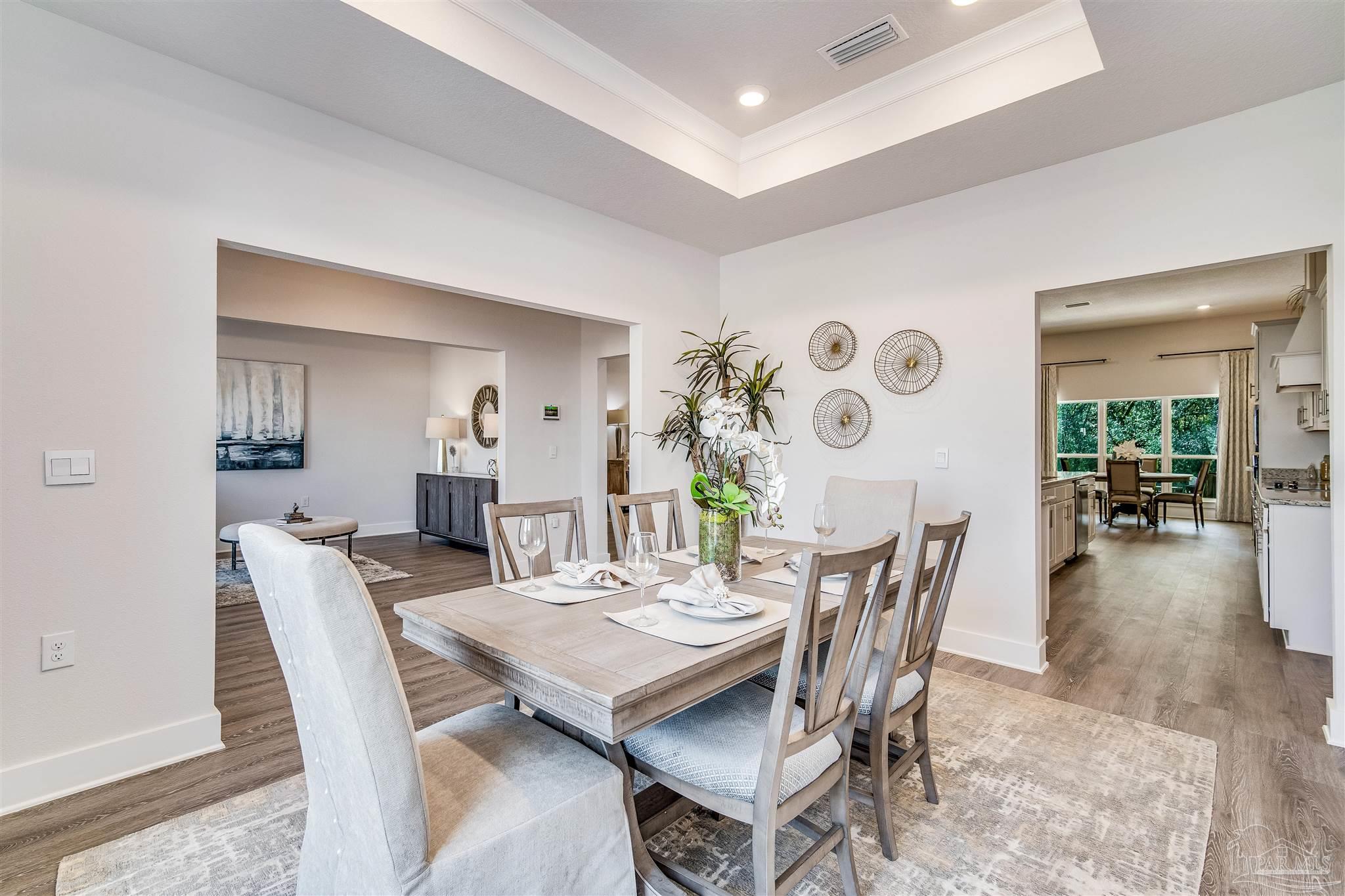 5780 Windham Road Milton, FL 32570 - Photo 5 of 37 a view of a dining room with furniture