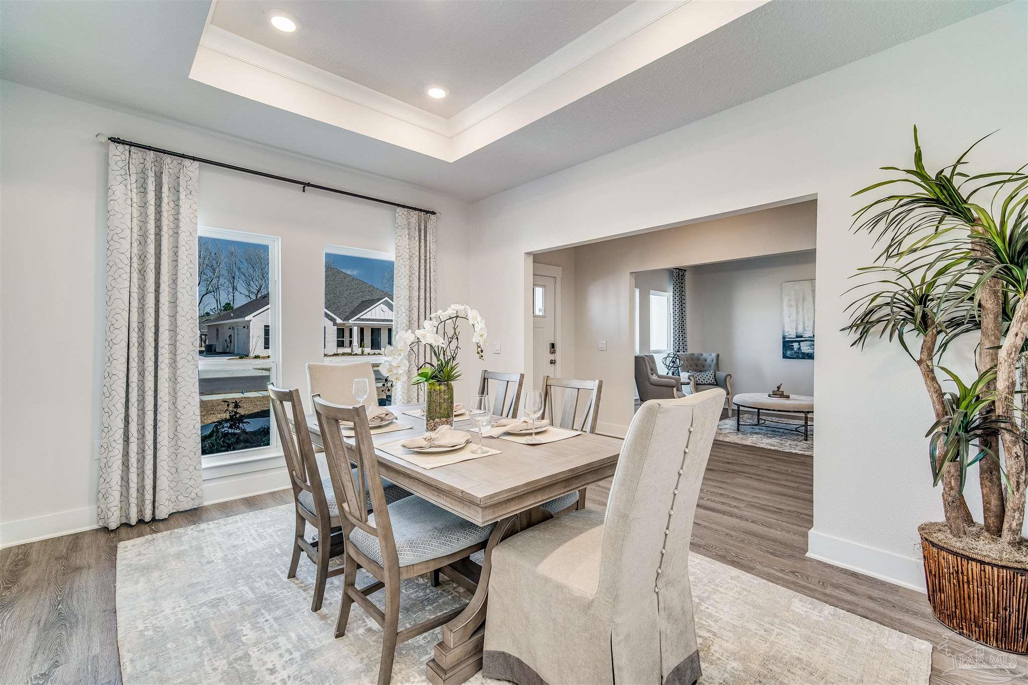 5780 Windham Road Milton, FL 32570 - Photo 6 of 37 a view of a dining room with furniture
