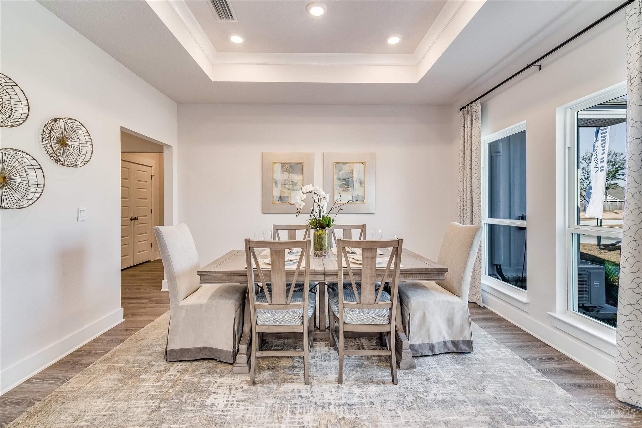 5780 Windham Road Milton, FL 32570 - Photo 7 of 37 a view of a dining room with furniture