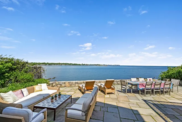 a view of a chairs and table on the terrace