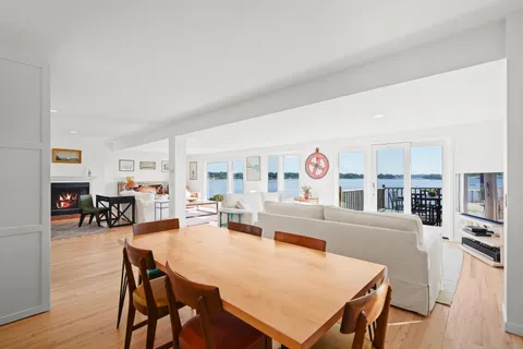 a view of a deck with two chairs and a table