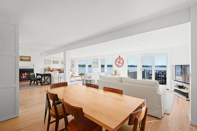 a view of a deck with two chairs and a table