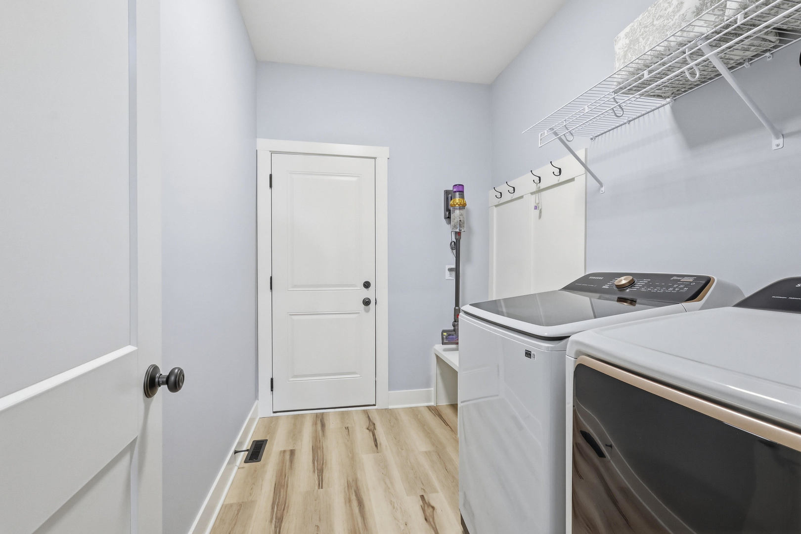 6779 Genesis Way Bettendorf, IA 52722 - Photo 25 of 36 a utility room with dryer and washer