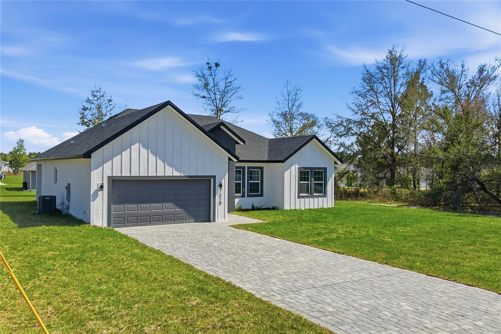 7518 Southwest 128th Street Ocala, FL 34473 - Photo 2 of 37