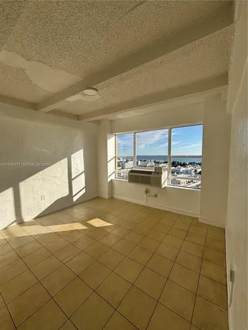 a view of a kitchen with a sink