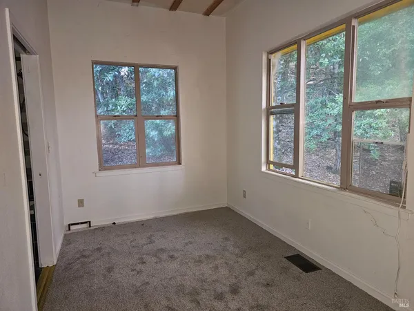 an empty room with a window