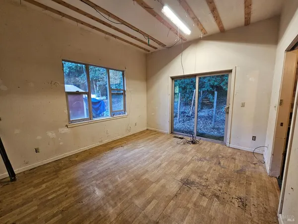 an empty room with windows