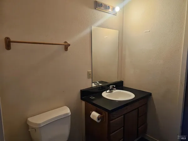 a bathroom with a sink and a toilet