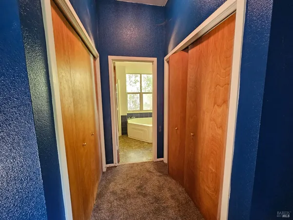 wooden floor in an empty room and a window