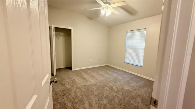 an empty room with a bathroom