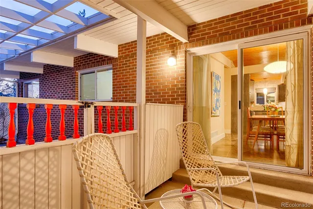 a view of a balcony with door