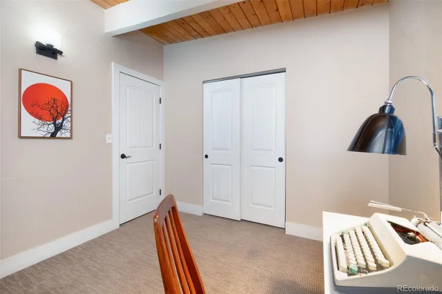 a bathroom with a sink a mirror and a shower