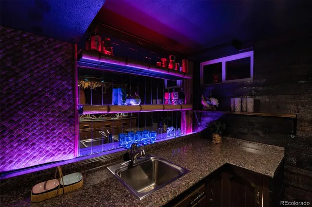 a room with lots of different colored cloths