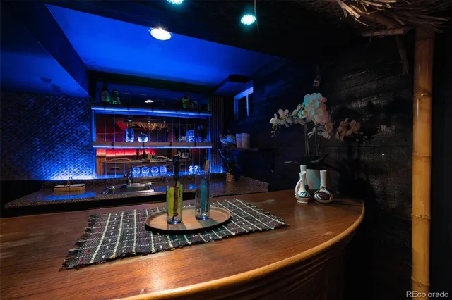 a outdoor space with patio furniture and a fireplace