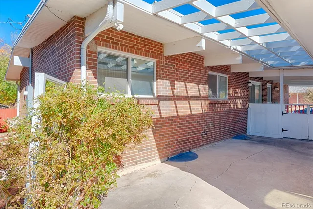 a view of a backyard with a small cabin