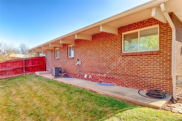 a view of yard with patio