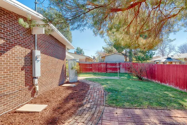 a view of swimming pool with a yard