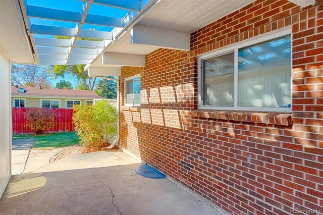a view of porch with a bench