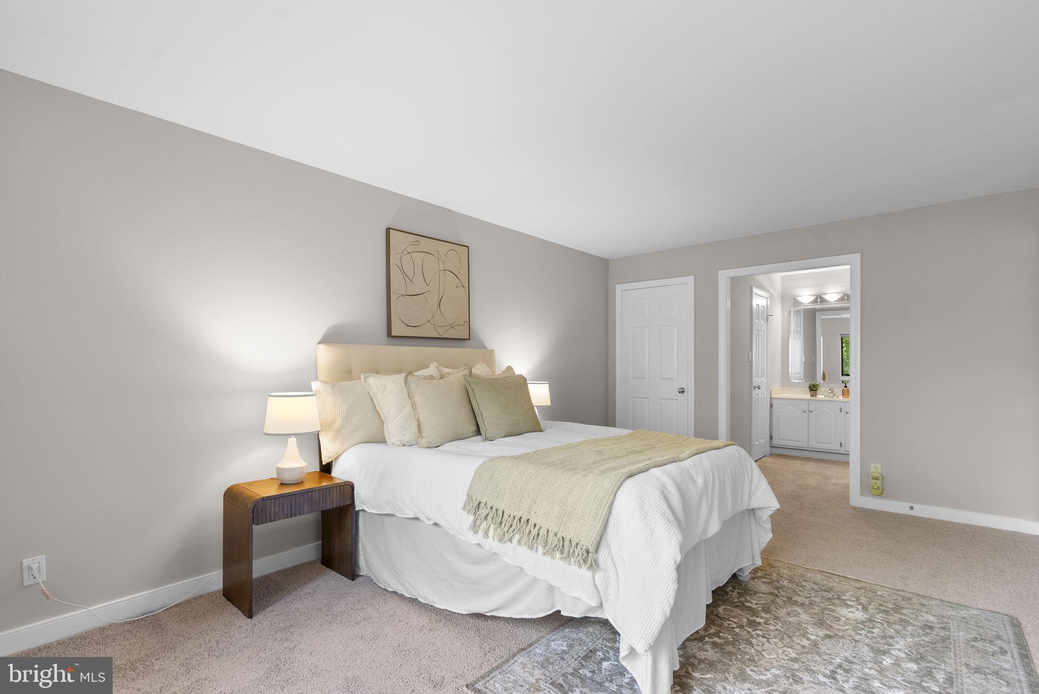 11420 Strand Drive, Unit R010 Rockville, MD 20852 - Photo 22 of 56 Primary Bedroom Suite