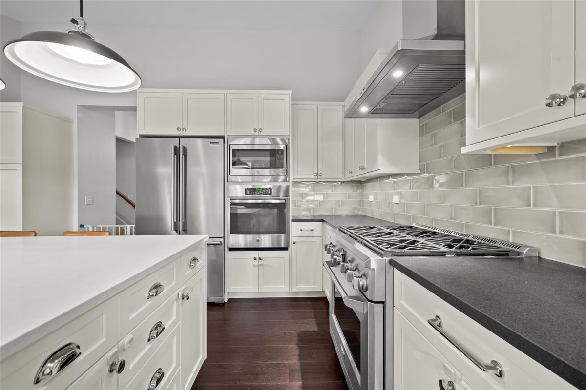 308 Signe Court Lake Bluff, IL 60044 - Photo 11 of 29 a kitchen with stainless steel appliances a sink stove and refrigerator