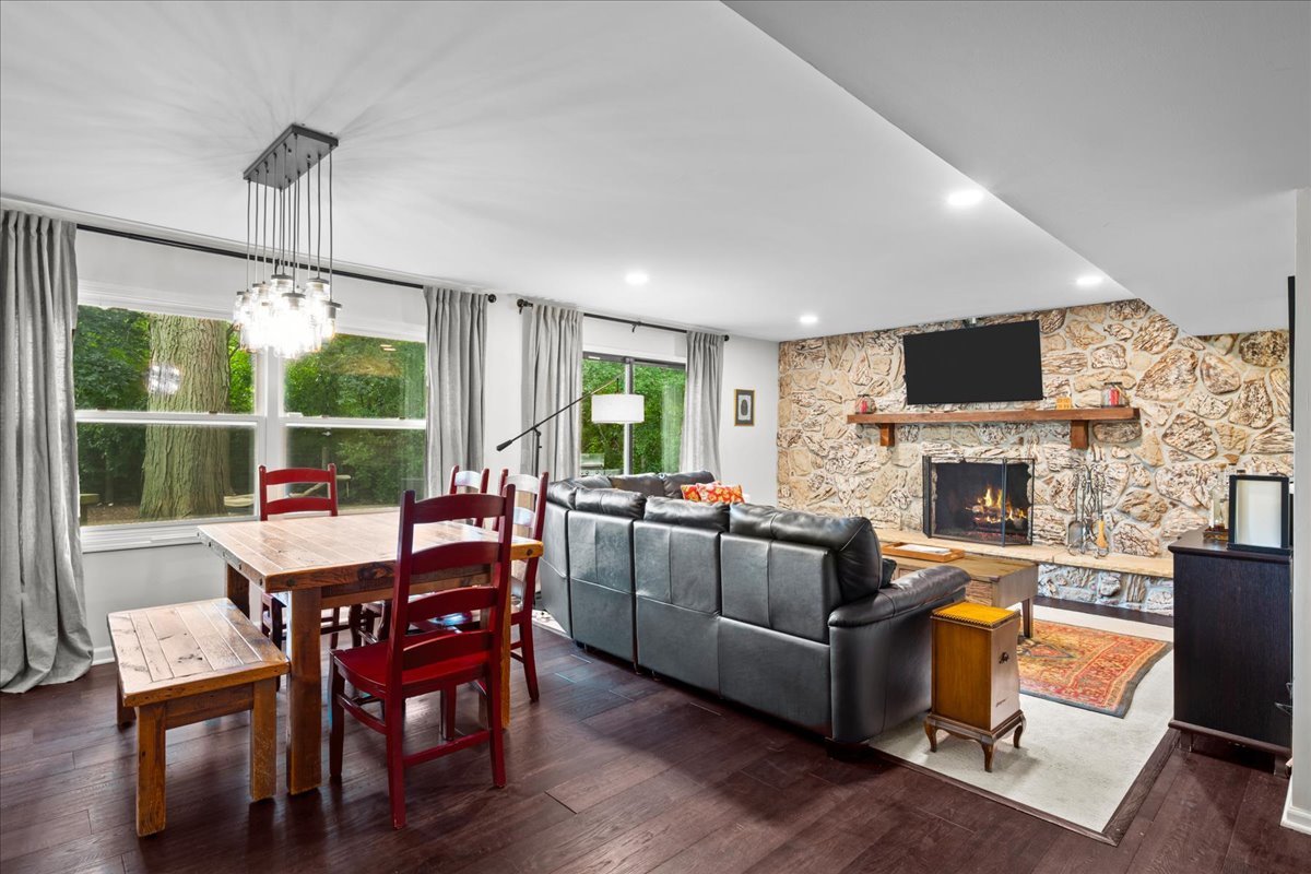 308 Signe Court Lake Bluff, IL 60044 - Photo 13 of 29 a living room with furniture a fireplace and a flat screen tv