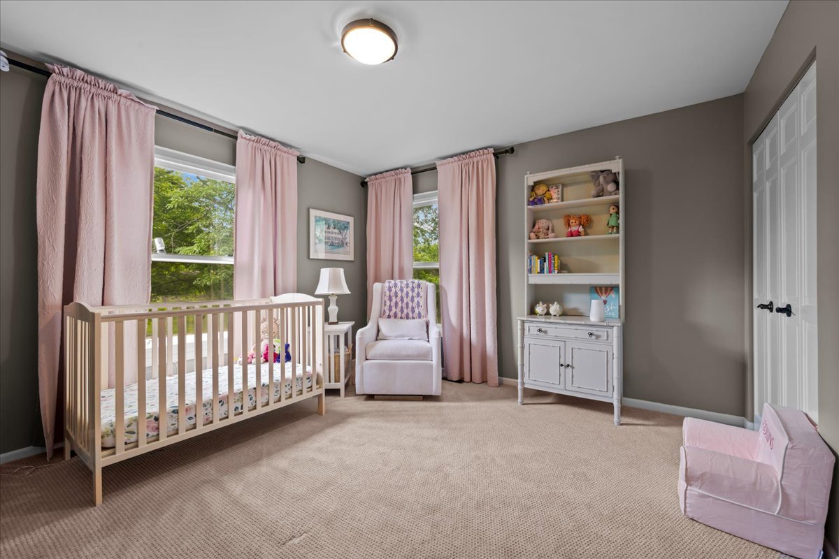 308 Signe Court Lake Bluff, IL 60044 - Photo 20 of 29 a view of a bedroom with furniture and windows