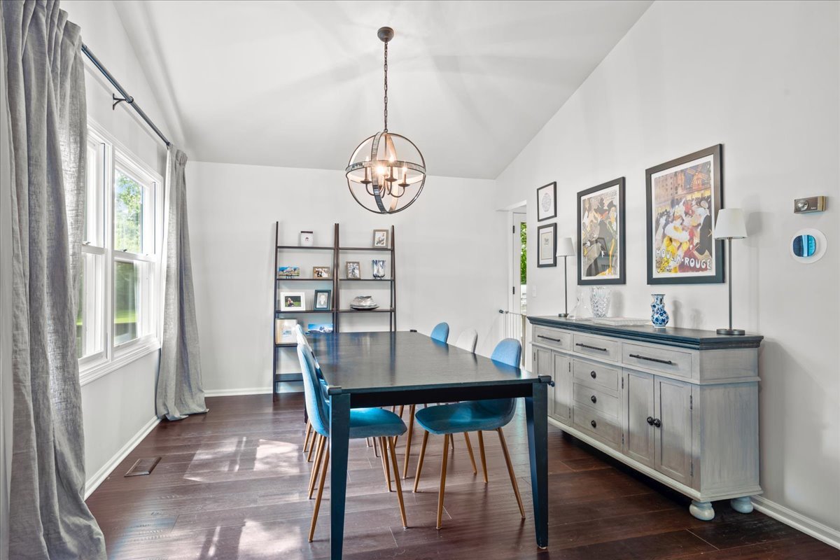 308 Signe Court Lake Bluff, IL 60044 - Photo 7 of 29 a view of a dining room with furniture window and wooden floor