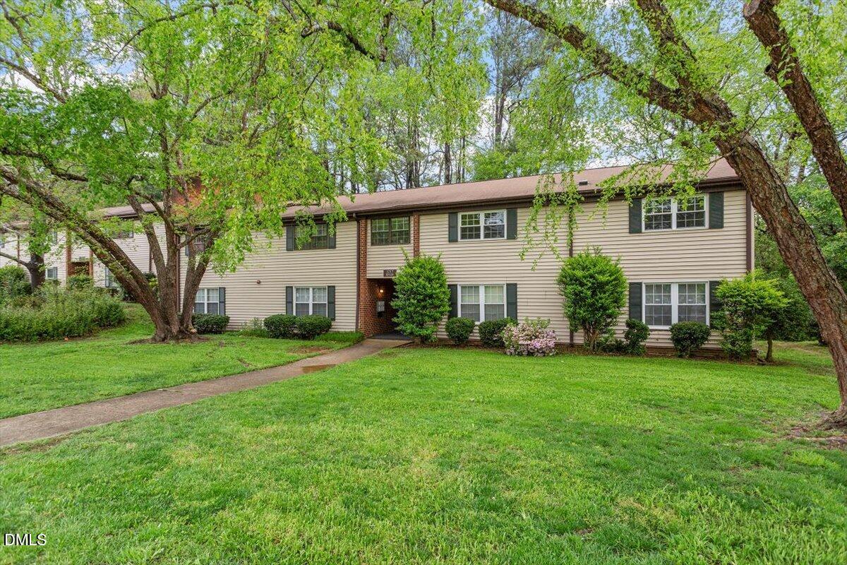 1217 H Manassas Court, Unit H Raleigh, NC 27609 - Photo 2 of 30 a front view of house with yard and green space