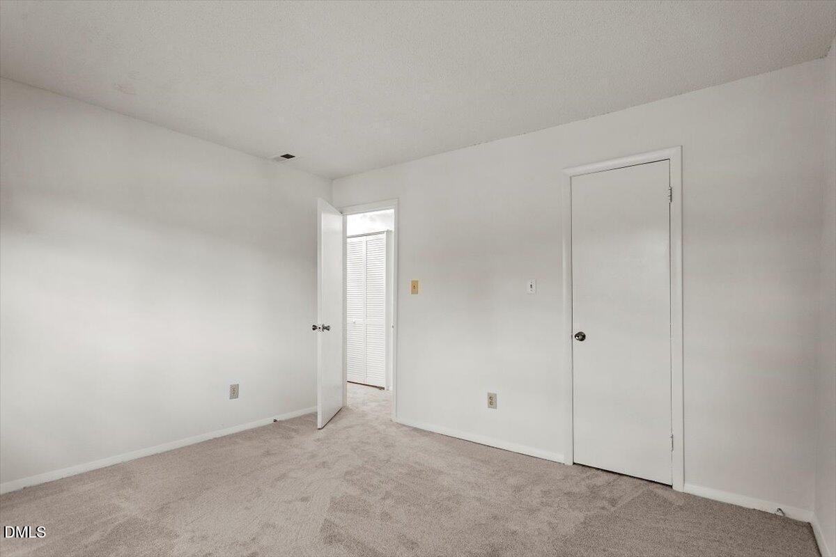 1217 H Manassas Court, Unit H Raleigh, NC 27609 - Photo 22 of 30 a view of an empty room