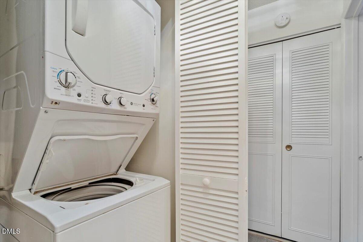 1217 H Manassas Court, Unit H Raleigh, NC 27609 - Photo 28 of 30 a utility room with dryer and washer