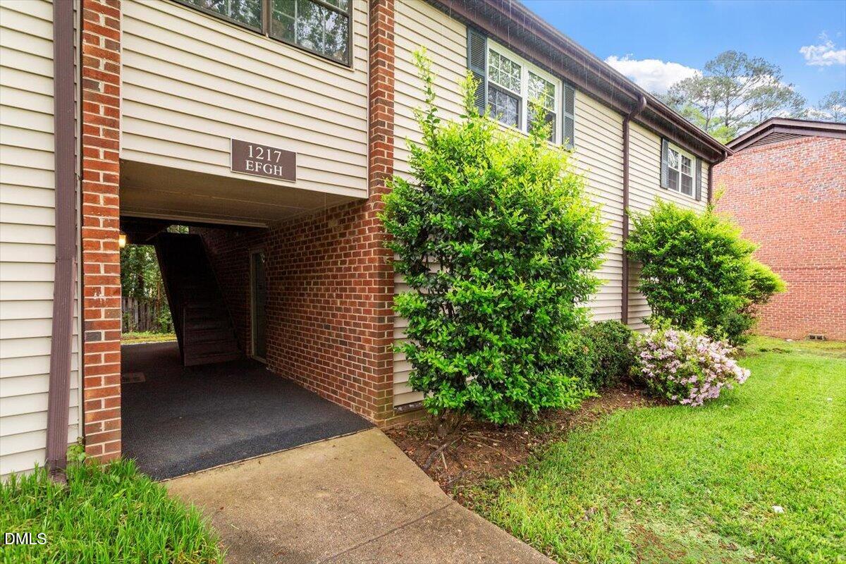 1217 H Manassas Court, Unit H Raleigh, NC 27609 - Photo 3 of 30 a view of a front door of the house