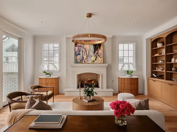 a living room with furniture couches and a fireplace