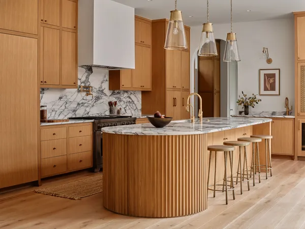 a kitchen with stainless steel appliances granite countertop a stove and a sink