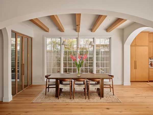 a bedroom with a bed and a chair