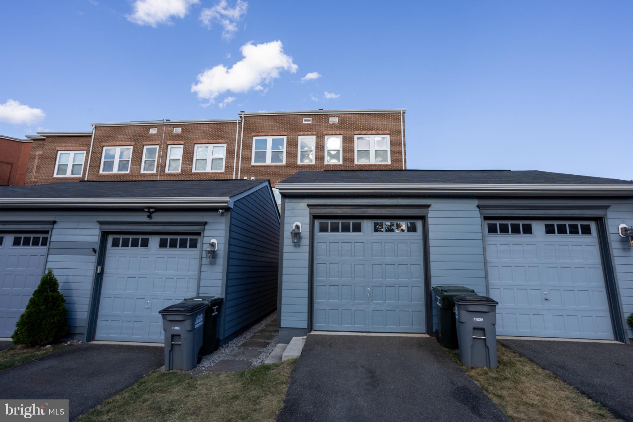 8941 Quarry Road Manassas, VA 20110 - Photo 11 of 44 Charming townhome with modern garage doors.
