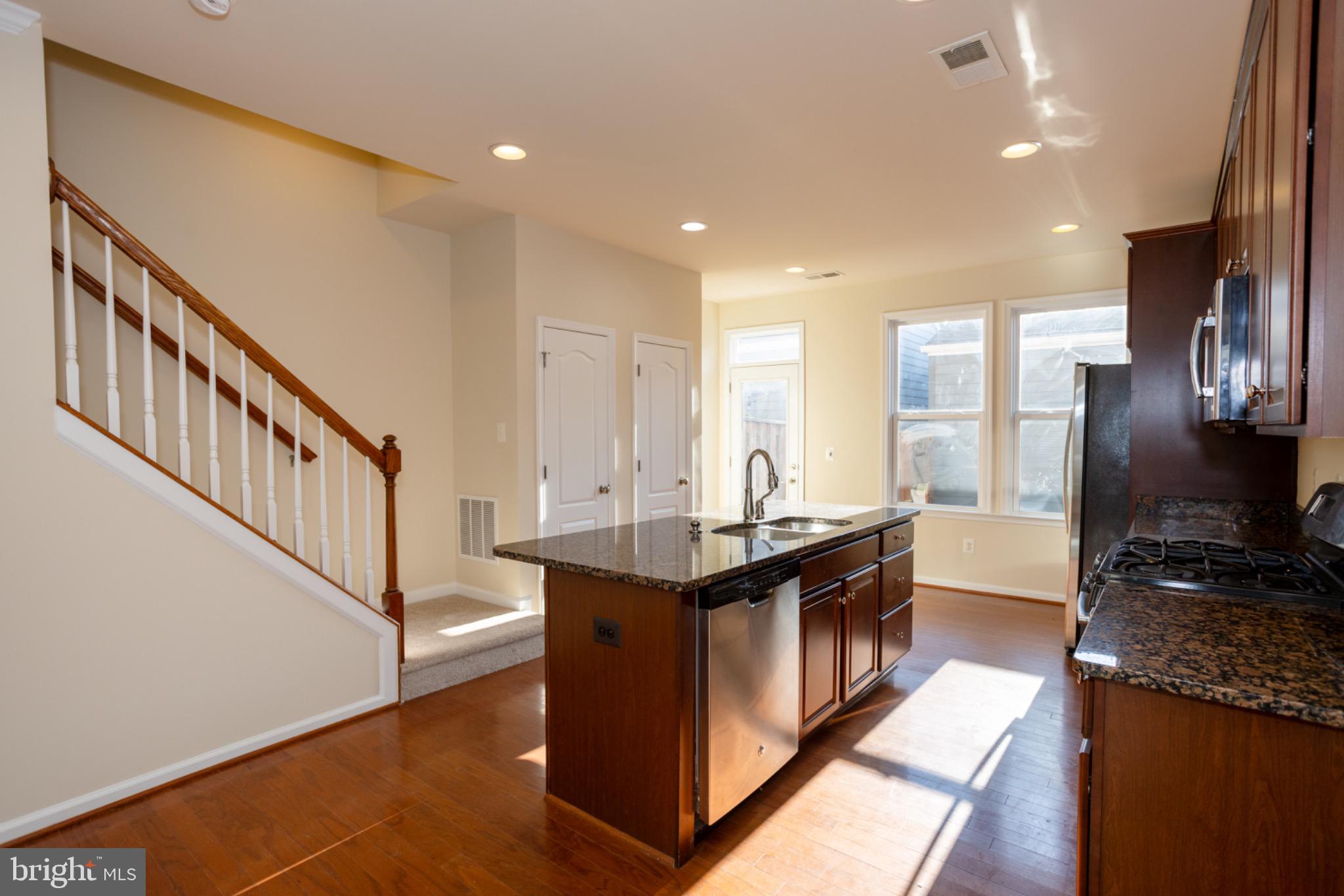 8941 Quarry Road Manassas, VA 20110 - Photo 15 of 44 Bright and inviting kitchen with modern finishes.