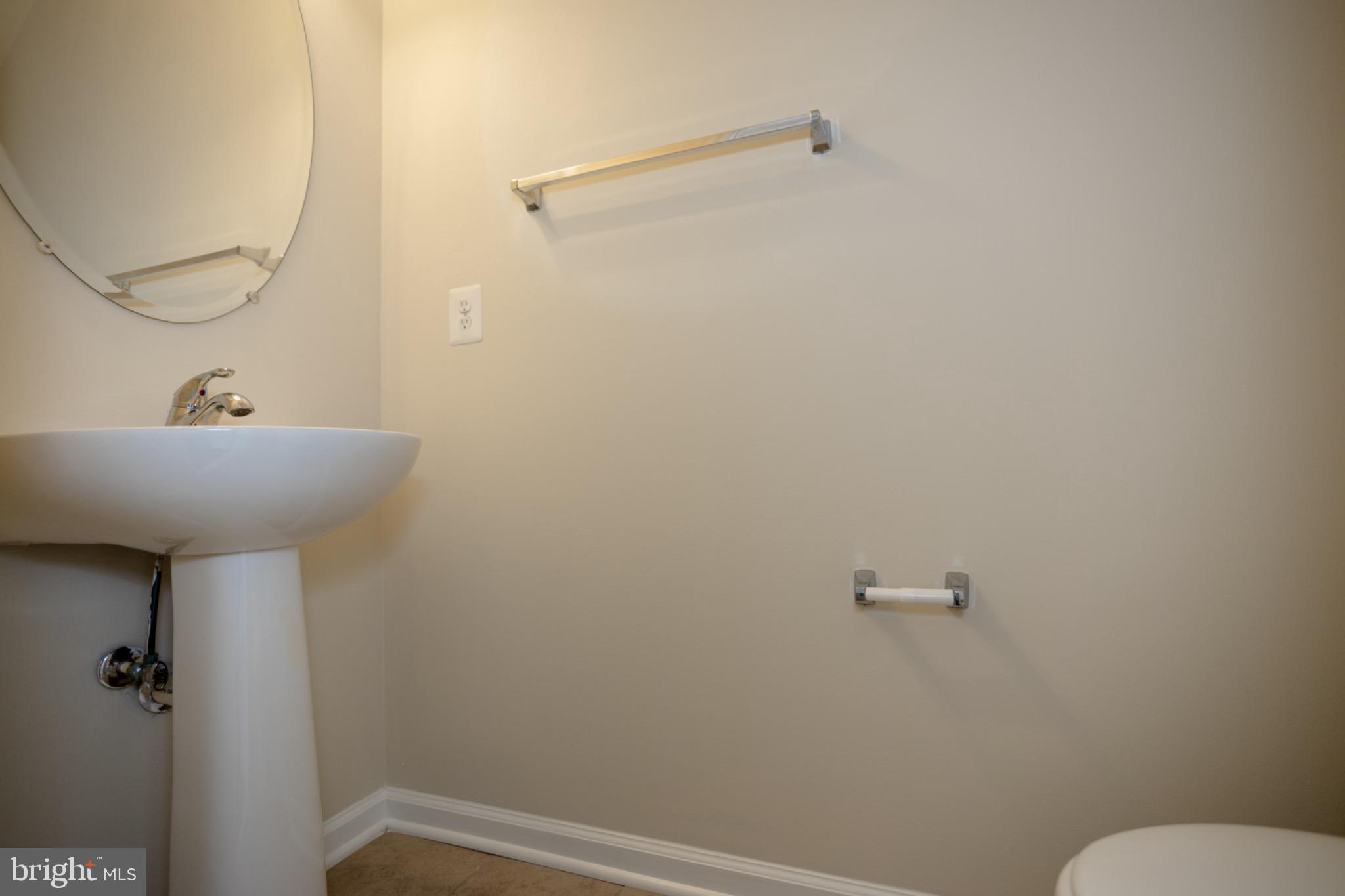 8941 Quarry Road Manassas, VA 20110 - Photo 18 of 44 Sleek and modern bathroom design.