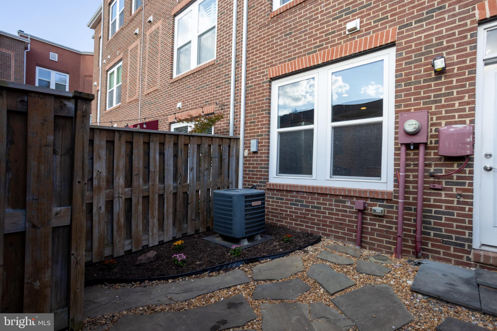 8941 Quarry Road Manassas, VA 20110 - Photo 43 of 44 Charming outdoor space with stone pathway.